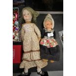 Vintage Dutch doll and porcelain head doll