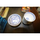 Nine blue and white tea bowls and saucers
