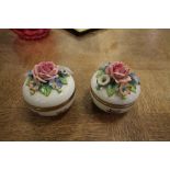 Pair Sitzendorf flower-encrusted trinket boxes