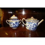 Blue and white teapot and sugar bowl of oriental design