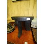 African ebonised, one piece stool