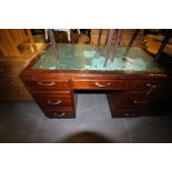 Oak leather-topped desk