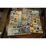 2 stamp albums containing various world stamps