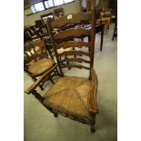 Five ladder back chairs and a carver chair