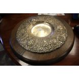 A good Arts and Crafts embossed white metal (thought to be silver) University Fellowship Alms dish '