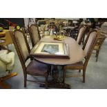 Oak extending dining table and four chairs