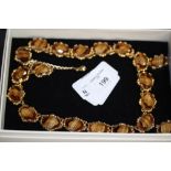 Gilt and tigers eye suite