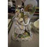 Continental soft paste porcelain figure - young couple group, crown over K mark to base, Dresden