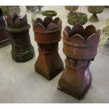 Pair of 19th century high fired stoneware chimney pots with crenellated tops (slight damage)