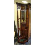 Late Victorian mahogany corner all stand with spindle turned panels, central bevelled mirror panel