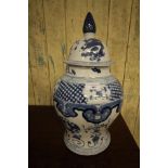 Pair of modern blue and white pottery baluster shaped vases and covers of Chinese design