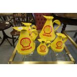 Five Graduating Reproduction "Shell" Oil Jugs