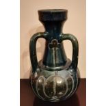 West German Art pottery three handled vase of Jugenstil design, dark green/blue glaze, 27cm high