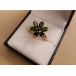 14ct gold green diopside Flower ring, central stone approx 0.3ct, six petals each approx 0.4ct, ring