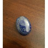 Lapis lazuli and white metal oval cabochon brooch, 4.2cm x 3.2cm