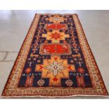 Kazak style hand woven runner, 344cm x 160cm Note: free delivery available within 30 miles of CA11
