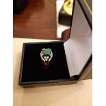 14k gold emerald and diamond ring of Mid Century design, emerald approx 0.75ct, ring size O