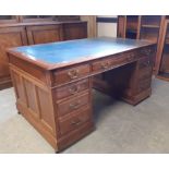 1920's panelled mahogany pedestal desk, blue leather cloth, fitted nine drawers, 152cm wide x 92cm