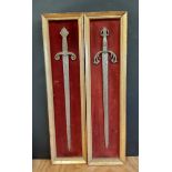 Two decorative display swords, mounted in gilt frames, 71cm x 18cm overall each