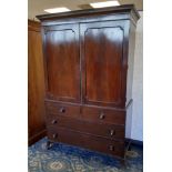 George III figured mahogany linen press, fitted three paper lined sliding trays and later handing