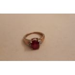 9ct gold, ruby and diamond ring, central ruby approx 1ct, ring size L