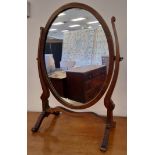 Mahogany oval skeleton toilet mirror, 34cm wide x 55cm high, one leg repaired