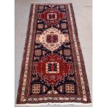 Kazak style hand woven runner, 293cm x 135cm Note: free delivery available within 30 miles of CA11