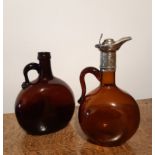 19th Century Madeira brown glass wine jug with engraved silver plated mount, 23cm high, hairline