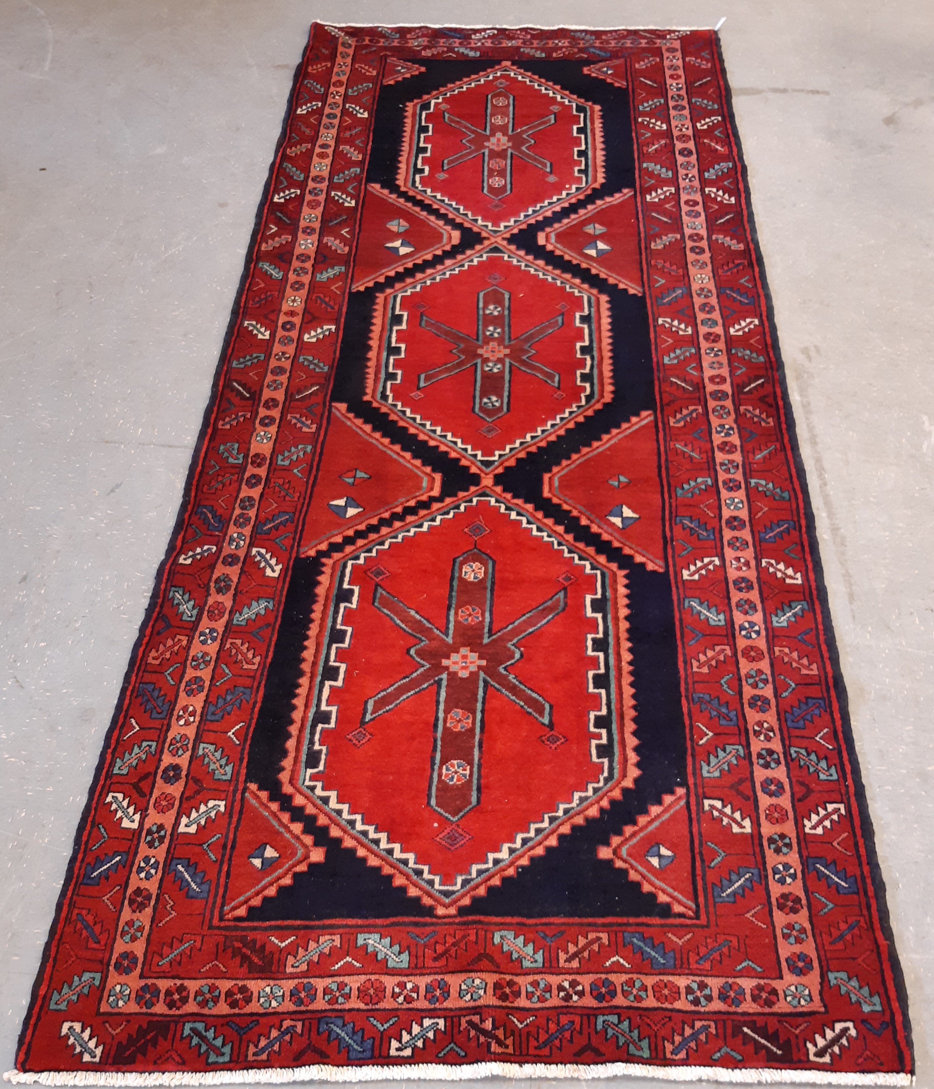 Shirvan style hand woven runner, 347cm x 147cm Note: free delivery available within 30 miles of CA11