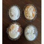 Four cameo oval brooches in white and gold coloured metal mounts