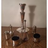 George V silver pepper pot, with plain baluster body, Chester 1921, two other silver pepper pots,