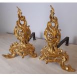 Pair of 19th Century French chenets, recently regilded by Tisserant of Paris, 29cm wide x 39cm