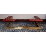 Late 20th Century brass extendable club fender, buttoned red vinyl seat