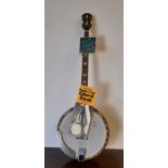 Good quality hickory five string Banjo, with extra strings and cord book