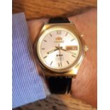 Gents vintage Orient automatic 21 jewel wristwatch, grey brushed metal dial with gilt Roman numerals