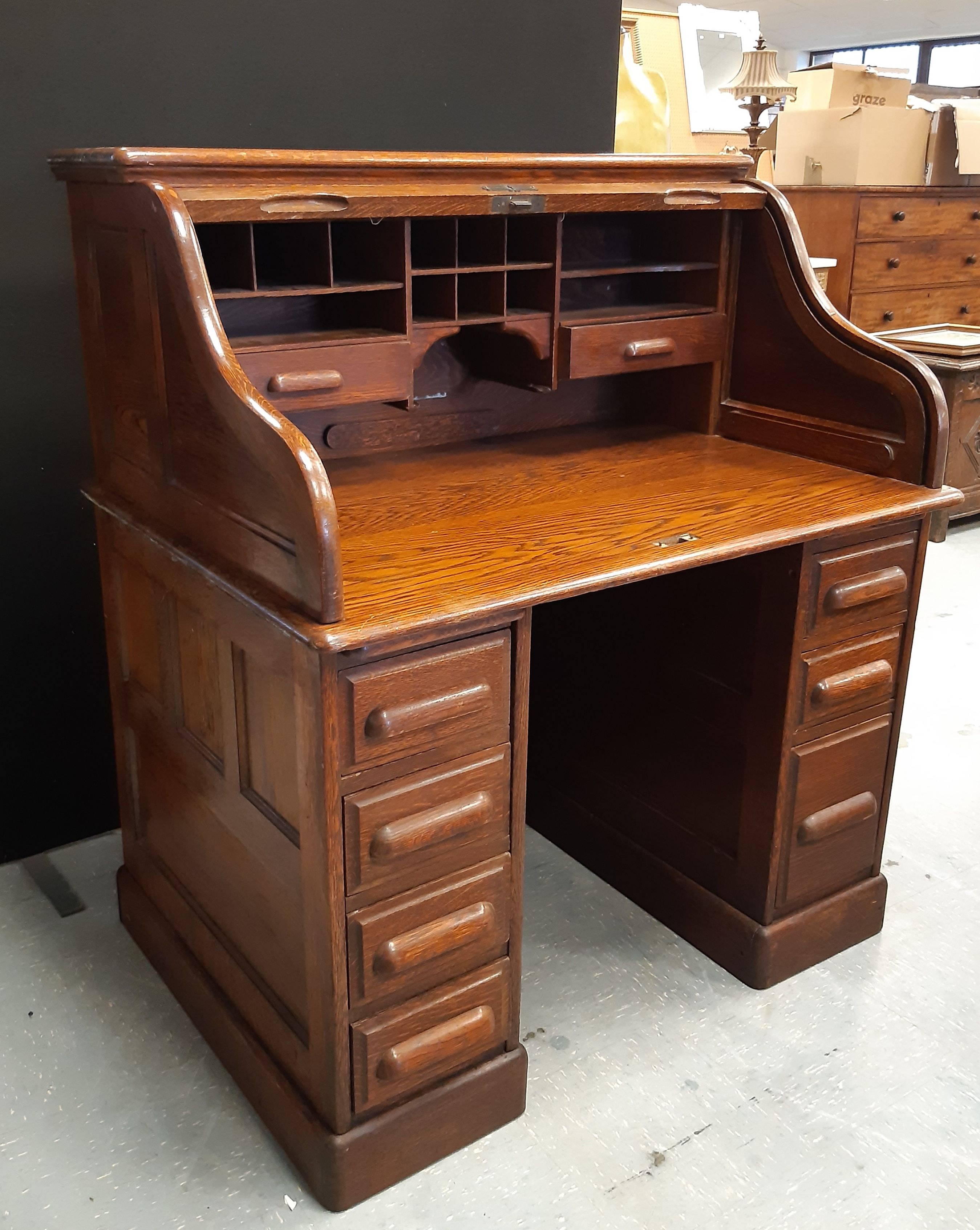 1930's panelled oak tambour top pedestal desk, 108cm wide x 80cm deep x 122cm high (top lacking lock - Image 2 of 3