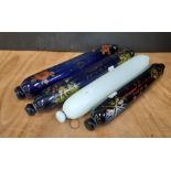 Four 19th Century Sailor's glass rolling pins, variously decorated, opaque white glass example