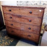 Early Victorian figured mahogany chest of drawers, fitted four long graduated drawers, on turned