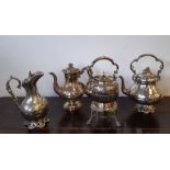 Victorian silver plated tea kettle and stand, two silver plated tea pots and a ditto hot water jug