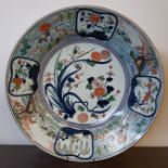 19th Century Japanese porcelain charger, 54cm diameter, riveted and with old repairs