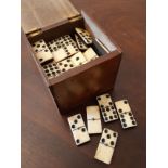 Box of 55 19th Century bone and ebony dominoes, good condition