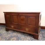 18th century panelled oak mule chest, fitted two drawers with four panel front on bracket feet,