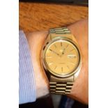 Gents vintage Seiko 5 automatic wristwatch, gilt dial with day/date, gilt metal case 40mm diameter