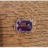 9ct gold mounted amethyst brooch of Victorian design, cushion cut stone 25mm x 10mm