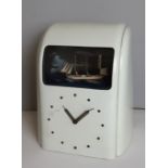 Vitascope Industries Ltd white bakelite Art Deco electric clock, with ship automaton, 31.5cm high,