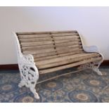 Victorian white painted cast iron garden bench in the Coalbrookdale manner