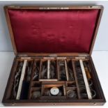 Victorian mahogany Optician's lenses case, organised into Concave, Cylindrical, Prismatic and