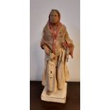 19th Century painted terracotta figure - Berber or Arabic woman, retaining original clothes,