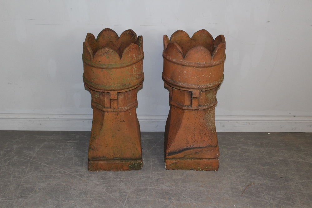 Pair of 19th century high fired stoneware chimney pots with crenellated tops (slight damage)