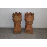Pair of 19th century high fired stoneware chimney pots with crenellated tops (slight damage)